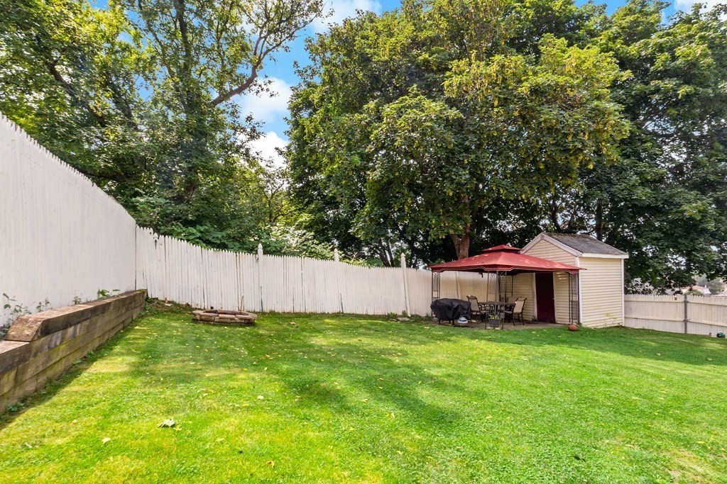 29 Florence Street Fall River, MA 02720 - Photo 32 of 34 a view of a house with a yard and sitting area