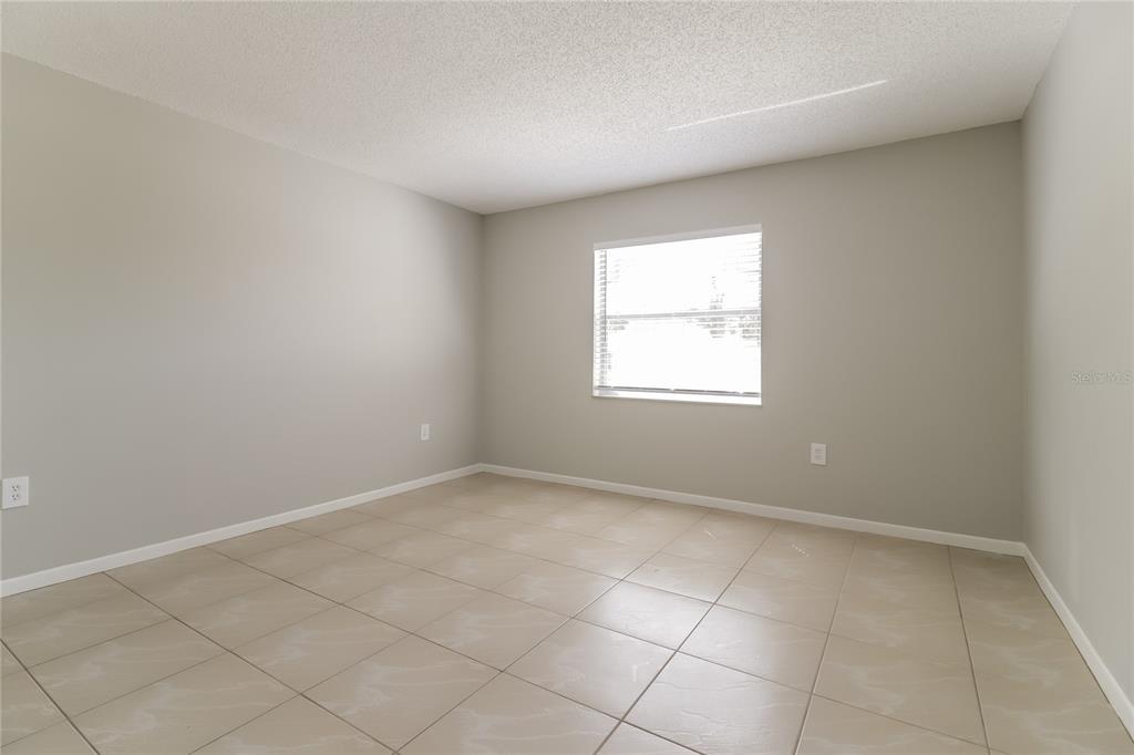 3014 Windchime Circle West Apopka, FL 32703 - Photo 6 of 16 an empty room with windows