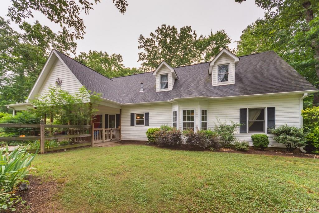 7218 Alexander Farm Road, Unit 3 B F Monroe, NC 28110 - Photo 1 of 24 a front view of a house with garden