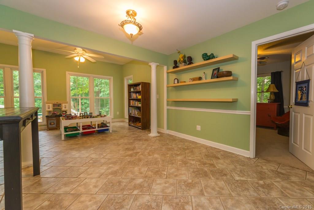 7218 Alexander Farm Road, Unit 3 B F Monroe, NC 28110 - Photo 11 of 24 a view of a livingroom with furniture and a large window