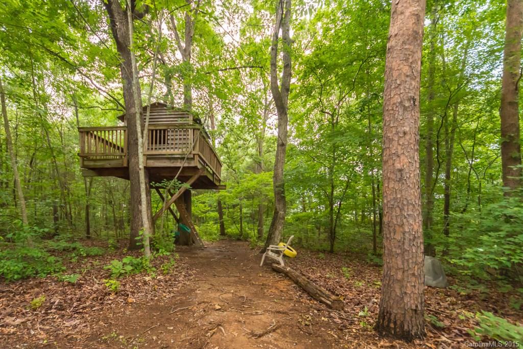 7218 Alexander Farm Road, Unit 3 B F Monroe, NC 28110 - Photo 20 of 24 a backyard of a house with lots of green space