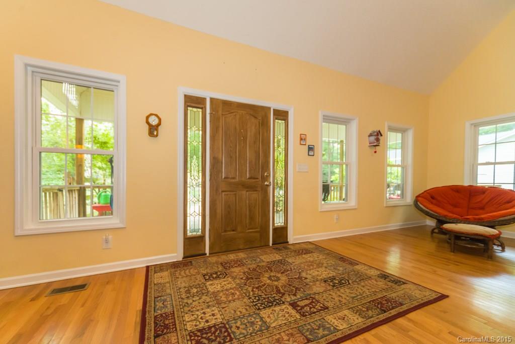 7218 Alexander Farm Road, Unit 3 B F Monroe, NC 28110 - Photo 4 of 24 a living room with a window and a rug