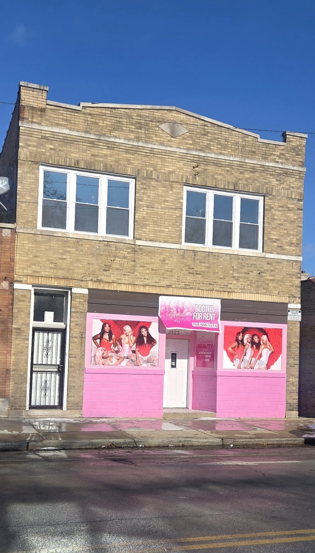 2822 West Marquette Road, Unit 2F Chicago, IL 60629 - Photo 2 of 17 a sign that is on the side of a building