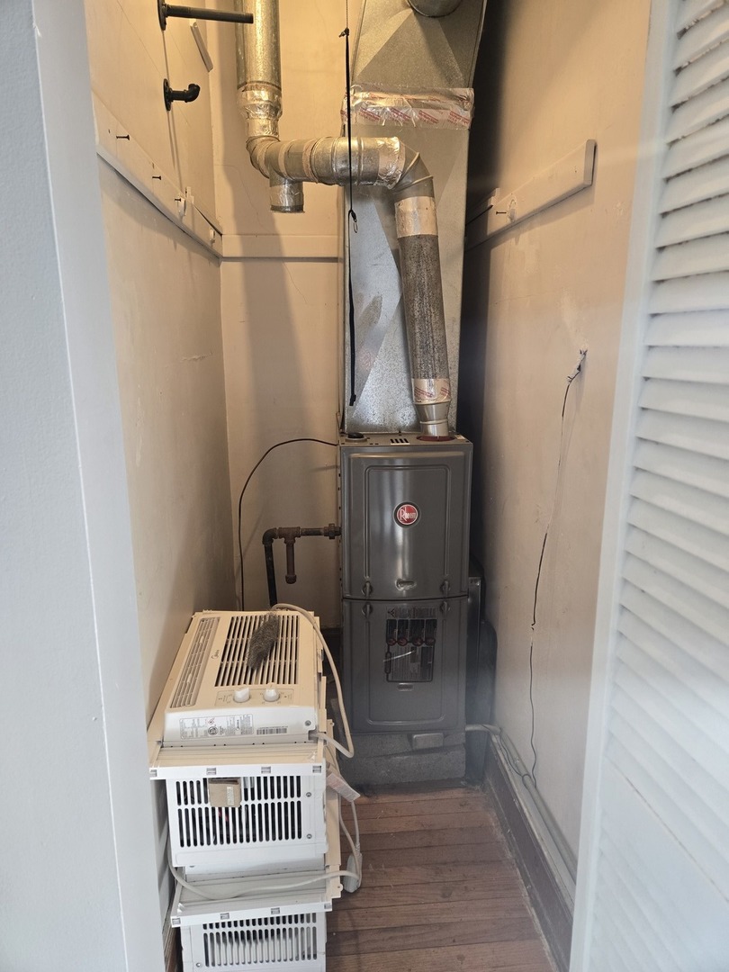 2822 West Marquette Road, Unit 2F Chicago, IL 60629 - Photo 10 of 17 a bathroom with a sink and a mirror