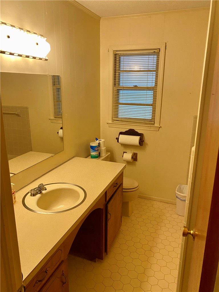 101 Deep Water Point Anderson, SC 29621 - Photo 25 of 34 Functional bathroom features a practical vanity with ample counter space and honeycomb tile flooring.