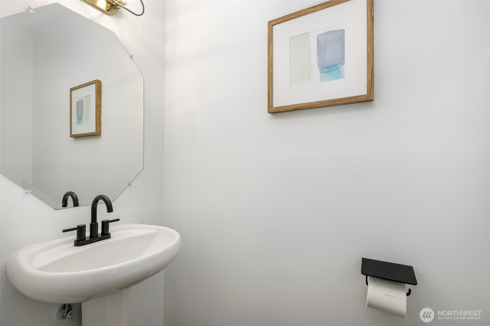 8828 238th Street Southwest, Unit C3 Edmonds, WA 98026 - Photo 16 of 29 a bathroom with a sink and mirror