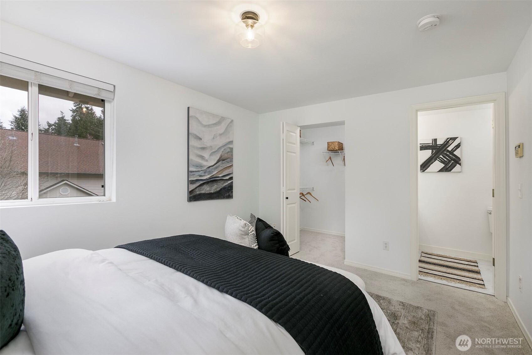 8828 238th Street Southwest, Unit C3 Edmonds, WA 98026 - Photo 18 of 29 a bedroom with a bed and a window