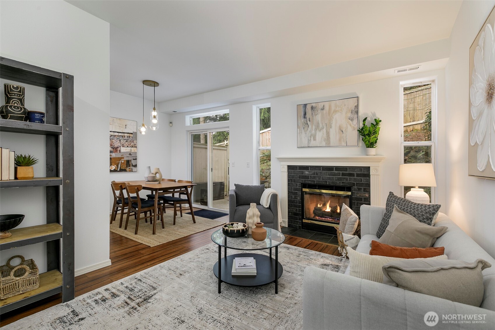8828 238th Street Southwest, Unit C3 Edmonds, WA 98026 - Photo 2 of 29 a living room with furniture and a fireplace