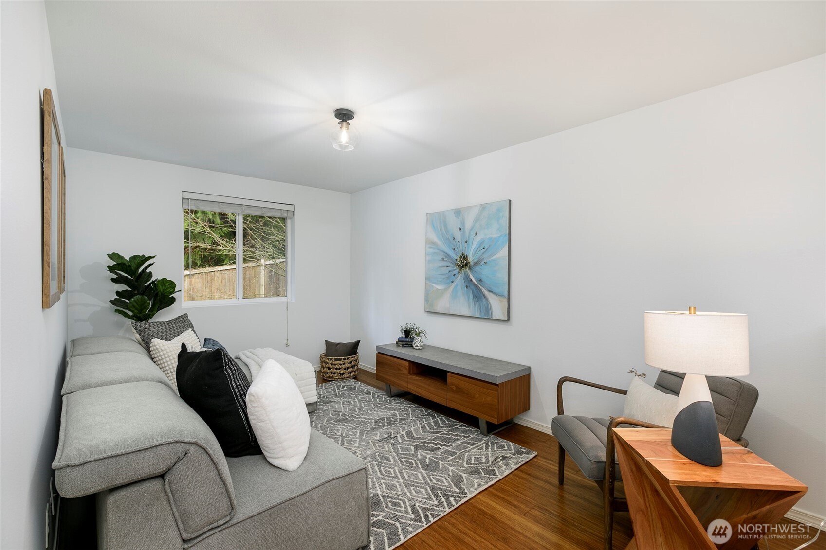 8828 238th Street Southwest, Unit C3 Edmonds, WA 98026 - Photo 23 of 29 a living room with furniture and a potted plant