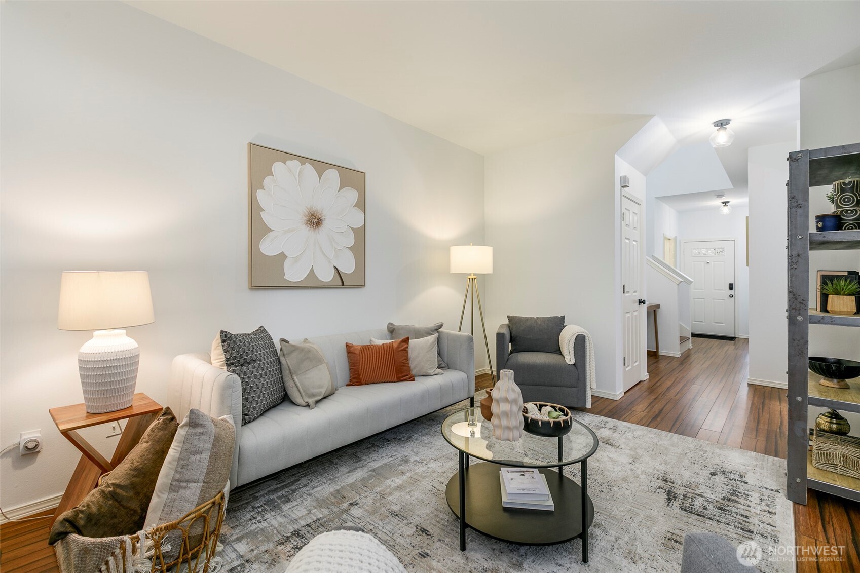 8828 238th Street Southwest, Unit C3 Edmonds, WA 98026 - Photo 5 of 29 a living room with furniture and wooden floor