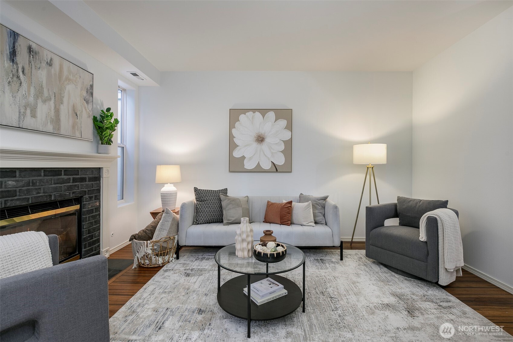 8828 238th Street Southwest, Unit C3 Edmonds, WA 98026 - Photo 6 of 29 a living room with furniture a rug and a fireplace