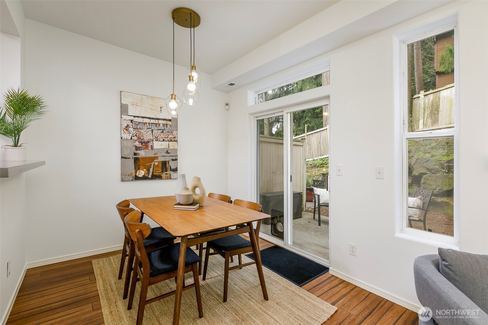 8828 238th Street Southwest, Unit C3 Edmonds, WA 98026 - Photo 9 of 29 a view of a dining room with furniture window and wooden floor