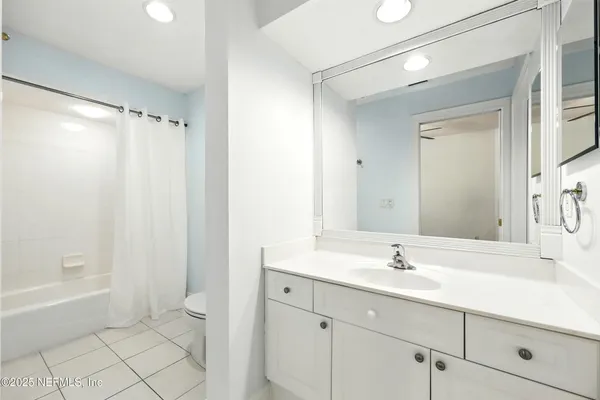 a view of a wooden door in front of house