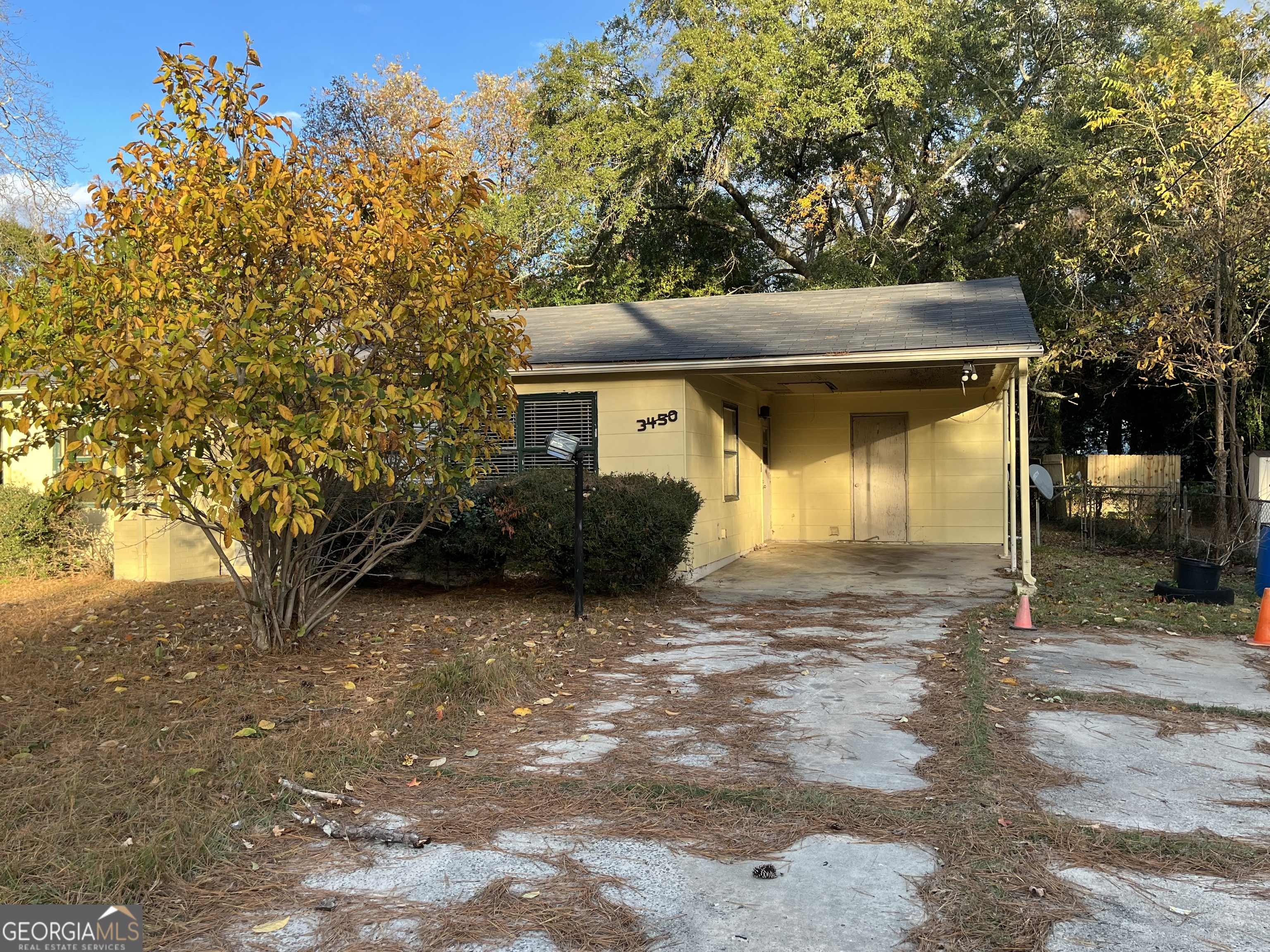 3450 Travis Boulevard Macon, GA 31206 - Photo 3 of 7 a view of a house with a tree
