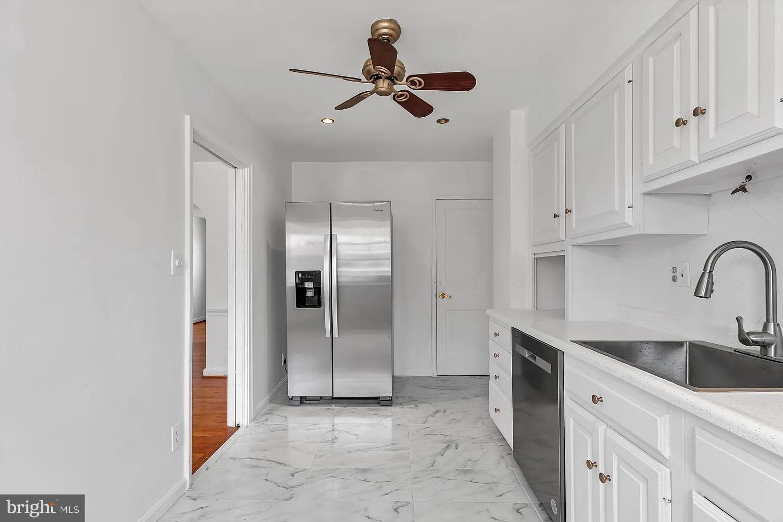 1804 Winford Road Baltimore, MD 21239 - Photo 6 of 17 Bright and airy modern kitchen space.