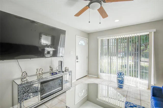 a kitchen with stainless steel appliances kitchen island granite countertop a sink and cabinets