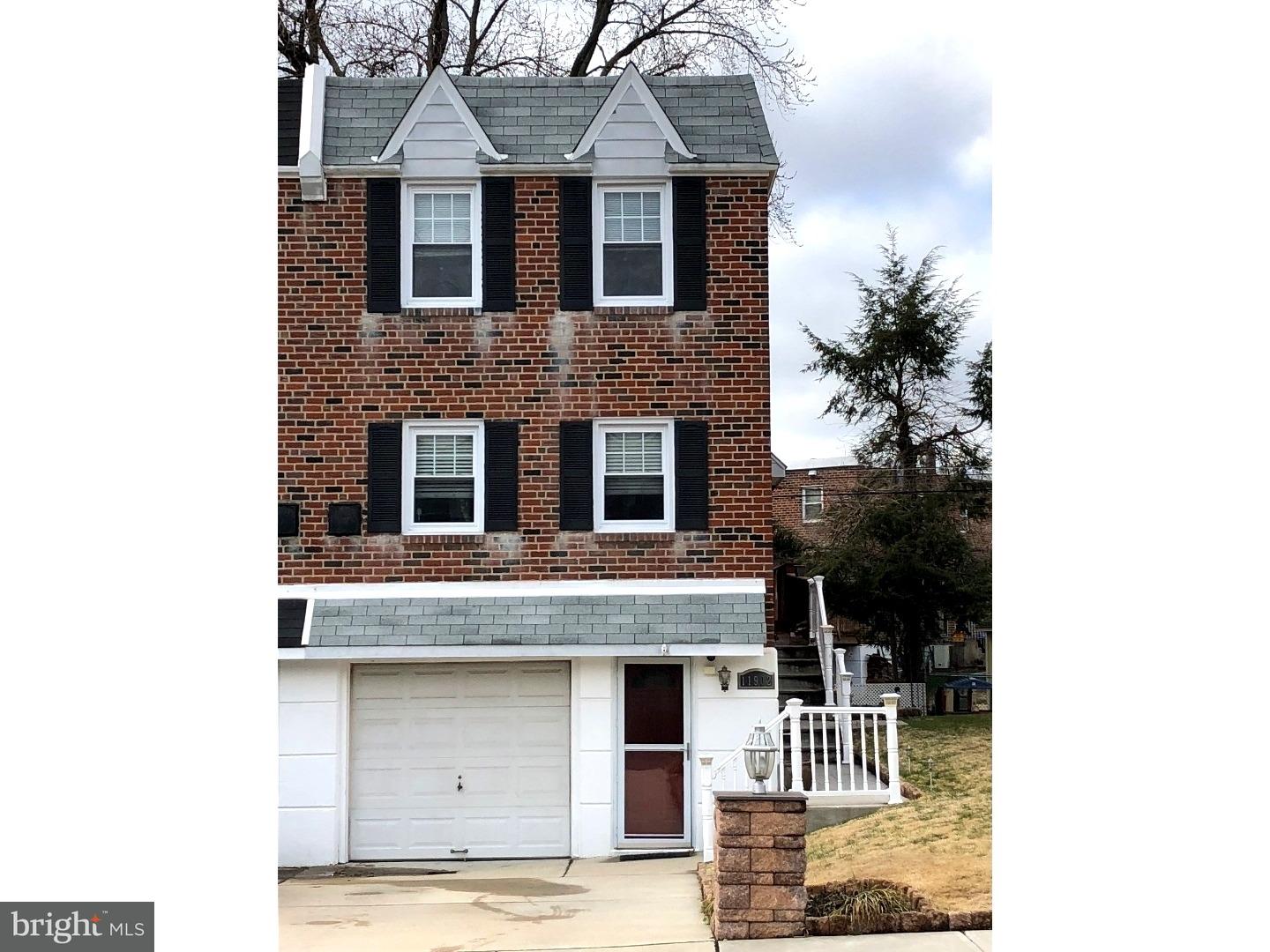 11902 Stevens Road Philadelphia, PA 19116 - Photo 1 of 21 a front view of a house with a yard