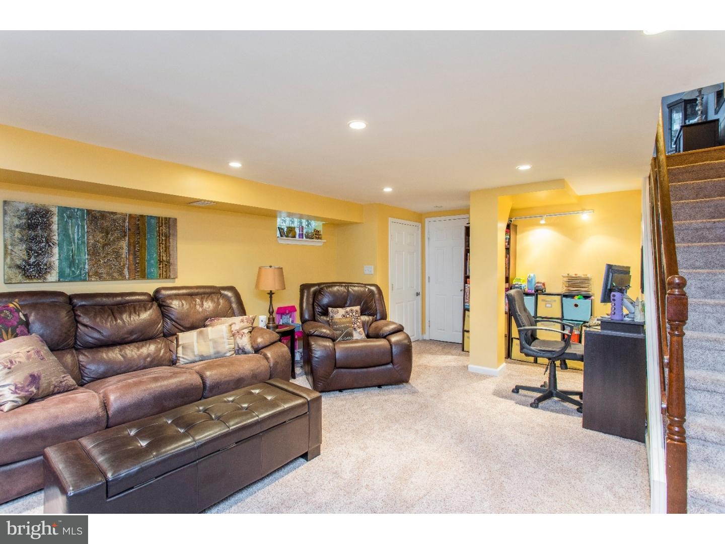 11902 Stevens Road Philadelphia, PA 19116 - Photo 19 of 21 a living room with furniture and a flat screen tv