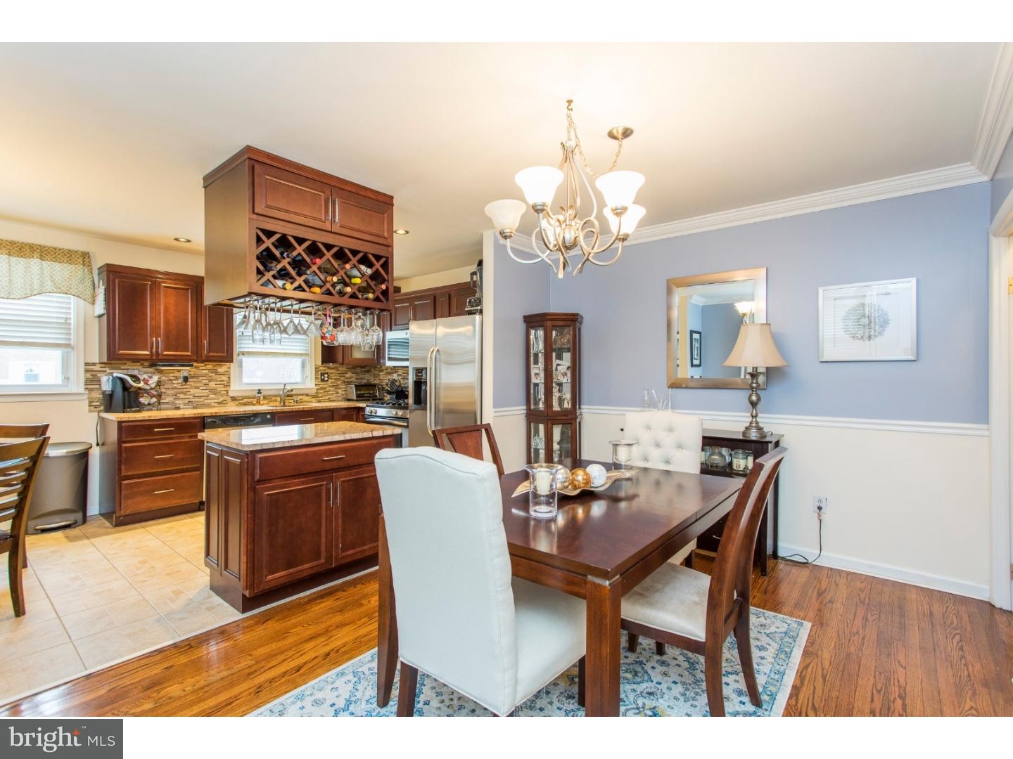 11902 Stevens Road Philadelphia, PA 19116 - Photo 3 of 21 a view of a dining room with furniture and chandelier
