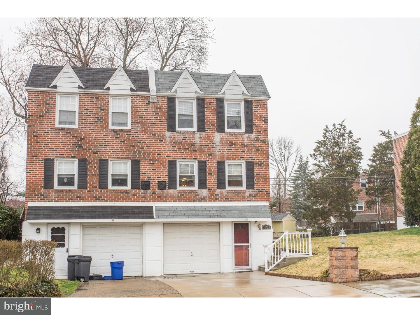 11902 Stevens Road Philadelphia, PA 19116 - Photo 21 of 21 a front view of a house with a yard