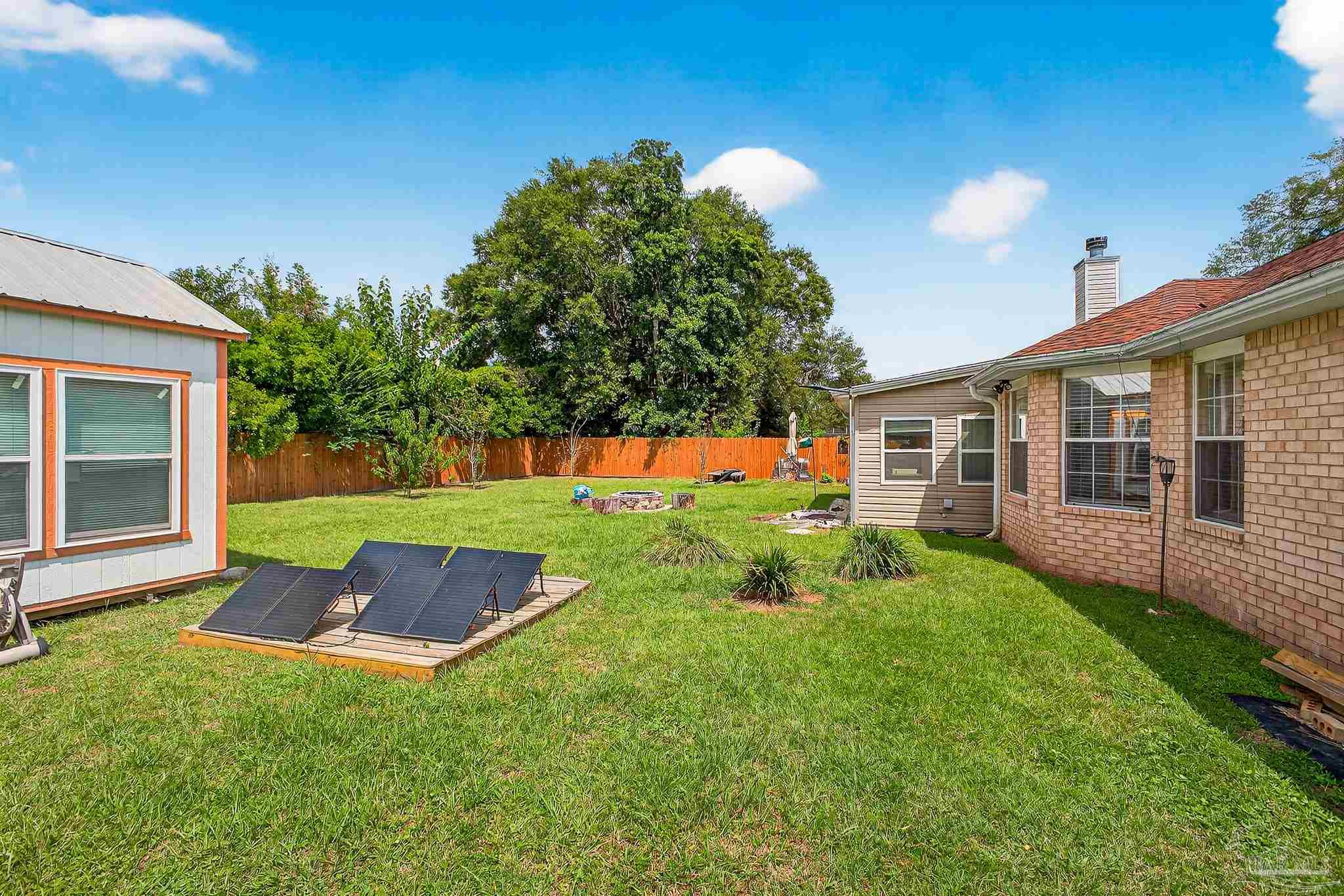10051 Bristol Park Road Cantonment, FL 32533 - Photo 18 of 60 a view of outdoor space yard and deck
