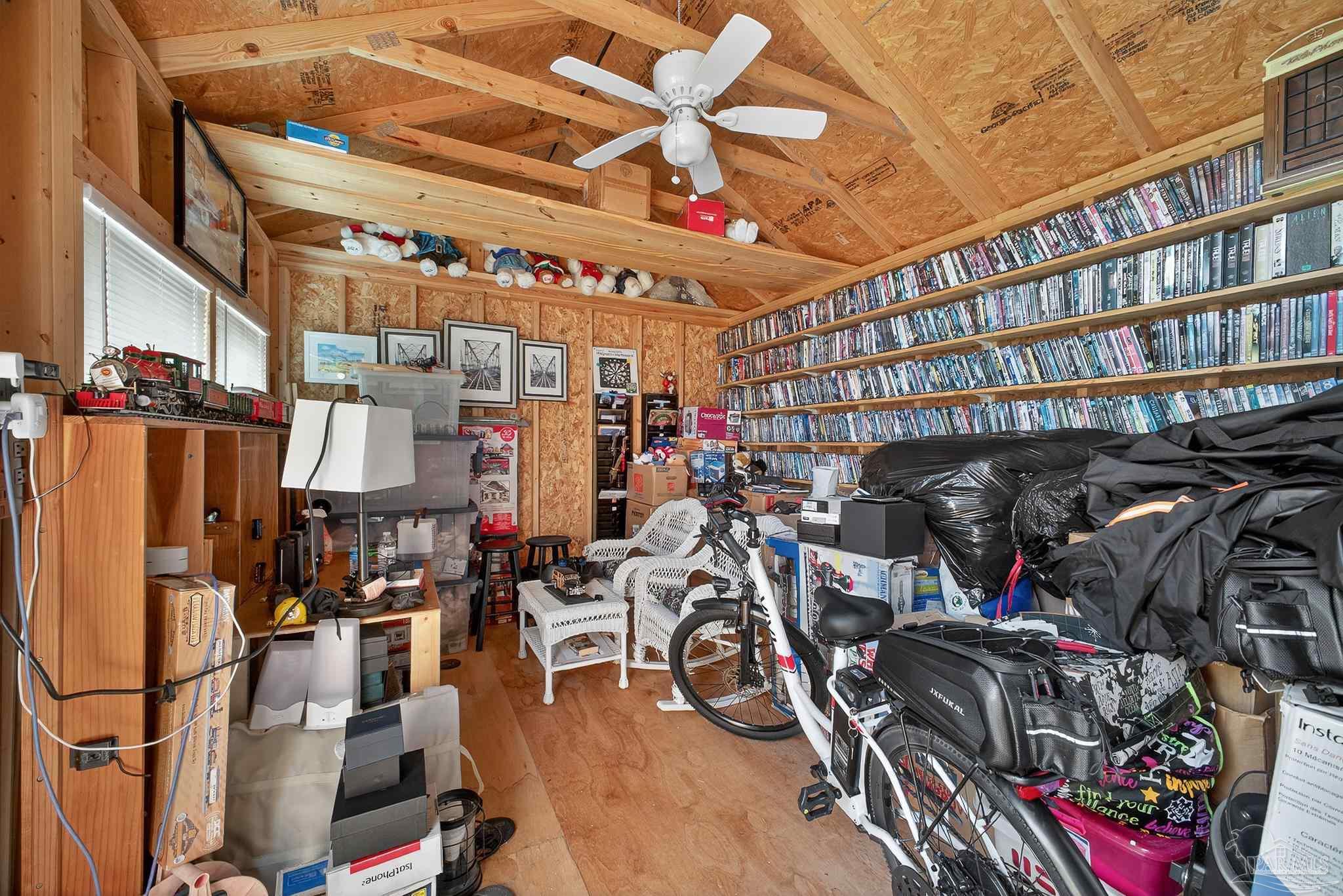 10051 Bristol Park Road Cantonment, FL 32533 - Photo 19 of 60 a view of a storage with bicycles