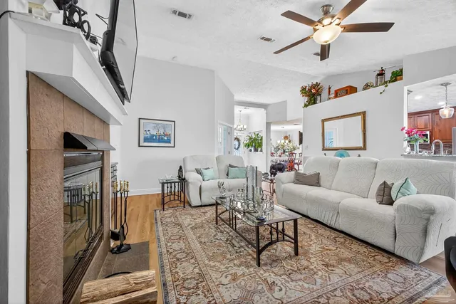a kitchen with stainless steel appliances a sink and a refrigerator