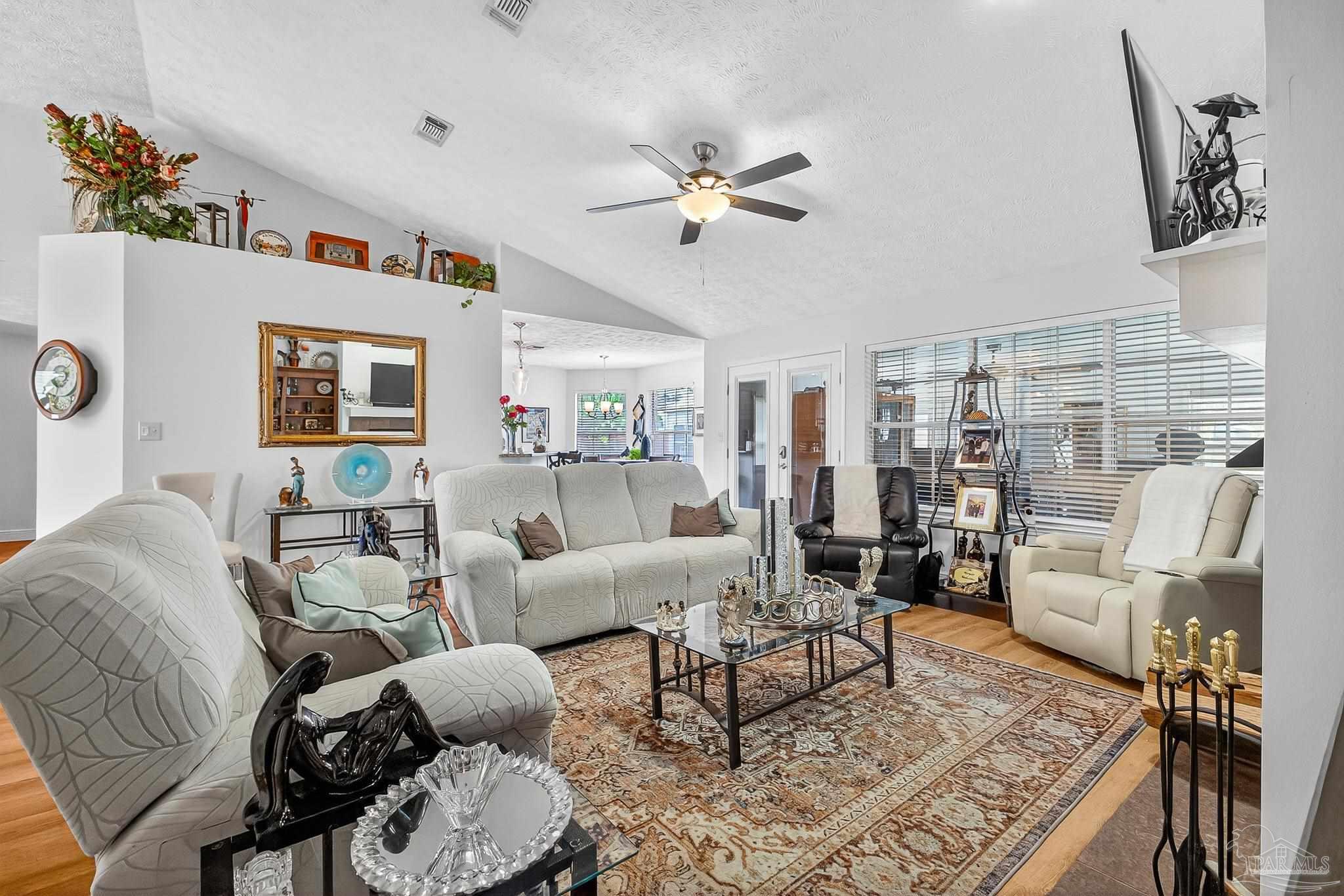 10051 Bristol Park Road Cantonment, FL 32533 - Photo 39 of 60 a living room with furniture