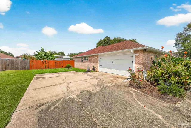 a vase of flowers sitting on a table