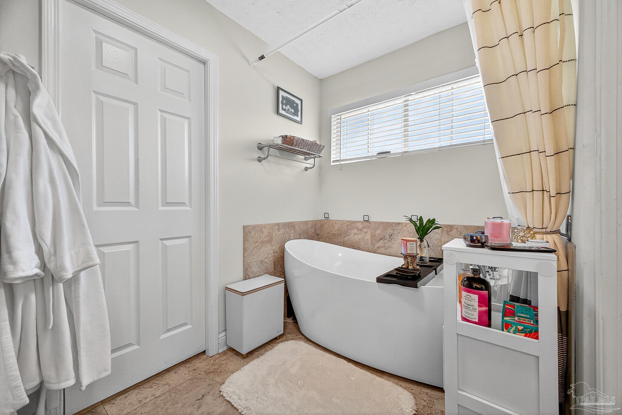 10051 Bristol Park Road Cantonment, FL 32533 - Photo 54 of 60 a room with storage and utility