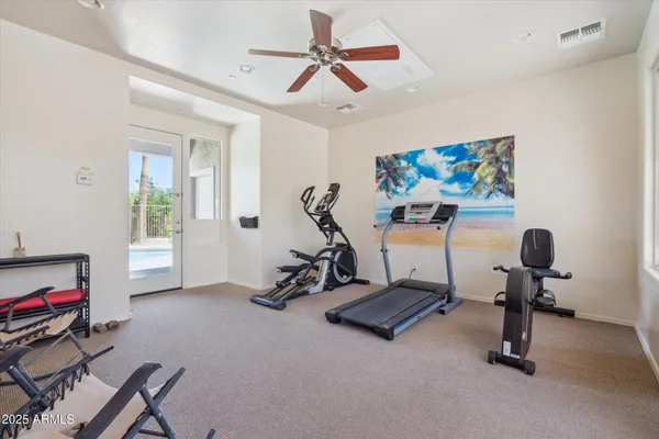 a view of a room with gym equipment