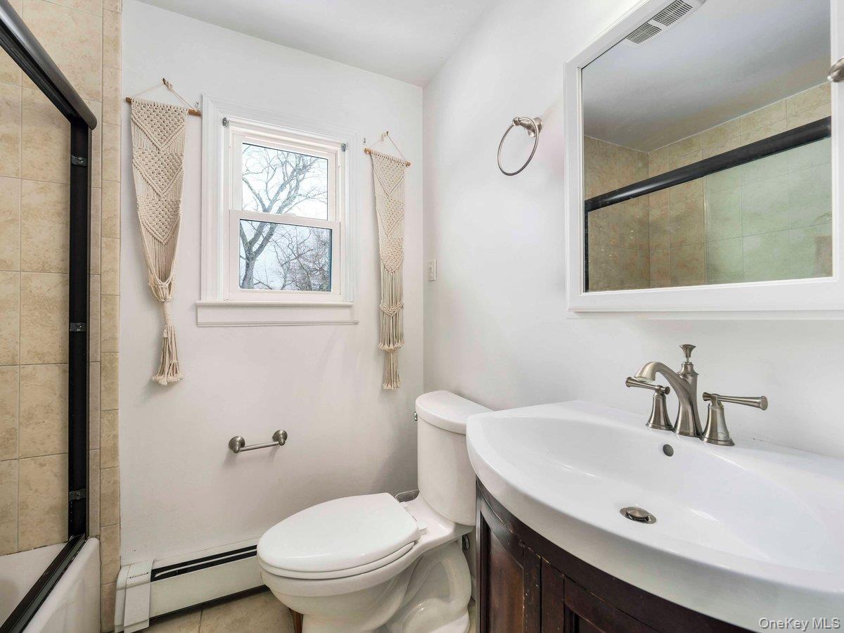 14 Harrigan Road Hopewell Junction, NY 12533 - Photo 20 of 45 a bathroom with a sink a toilet and a mirror