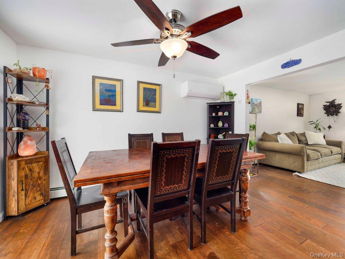 14 Harrigan Road Hopewell Junction, NY 12533 - Photo 8 of 45 a view of a dining room with furniture and wooden floor