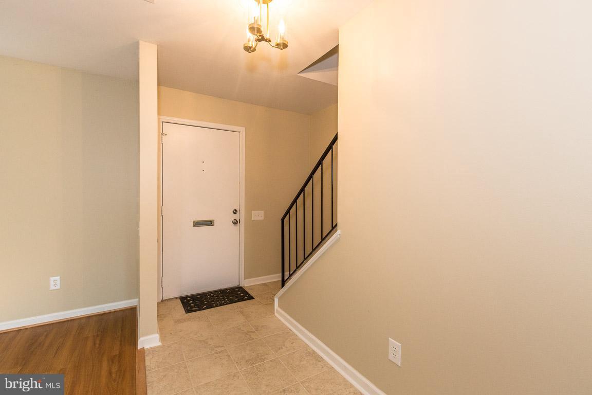 Entryway-(Porcelain Tile flooring(thru to Kitchen)