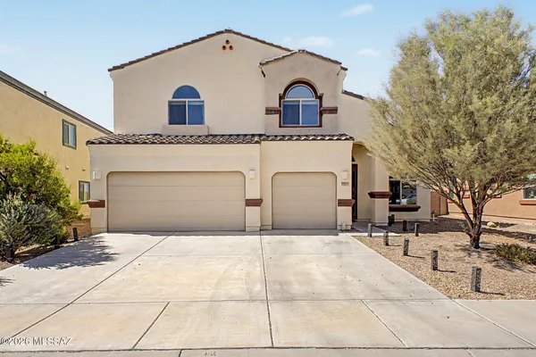 a house view with a outdoor space