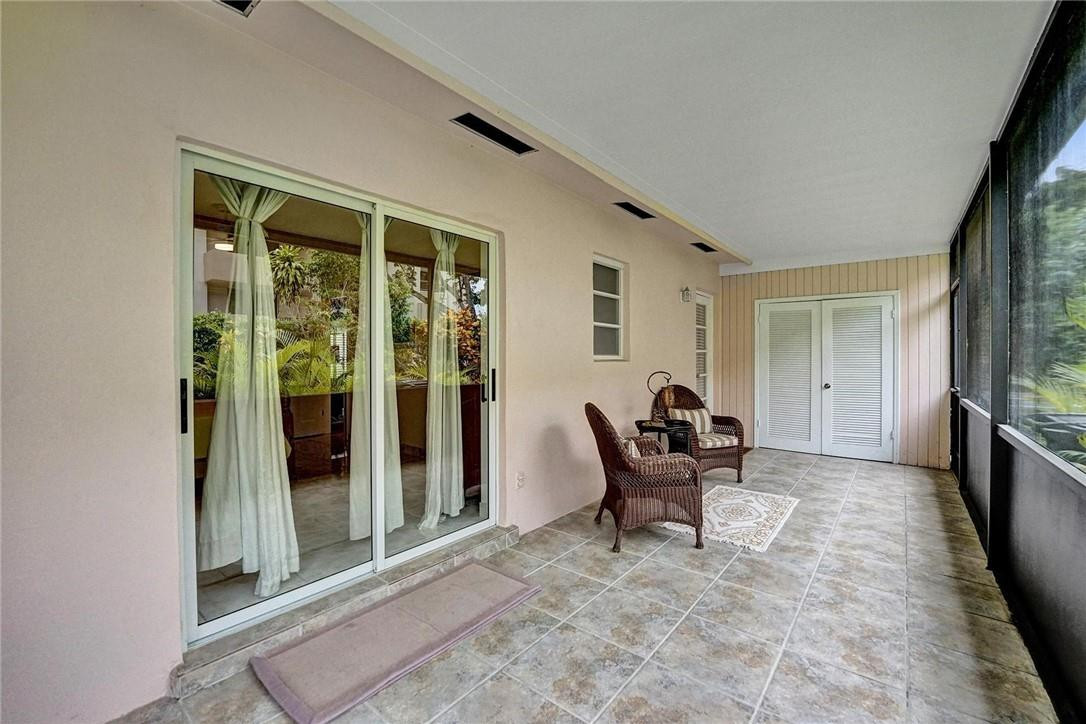 770 East Camino Real, Unit 3 Boca Raton, FL 33432 - Photo 18 of 34 a living room with furniture and a window