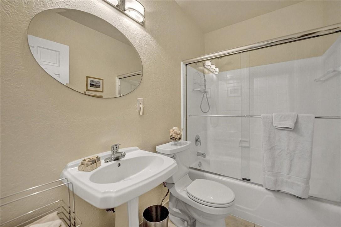 770 East Camino Real, Unit 3 Boca Raton, FL 33432 - Photo 29 of 34 a bathroom with a sink toilet and shower