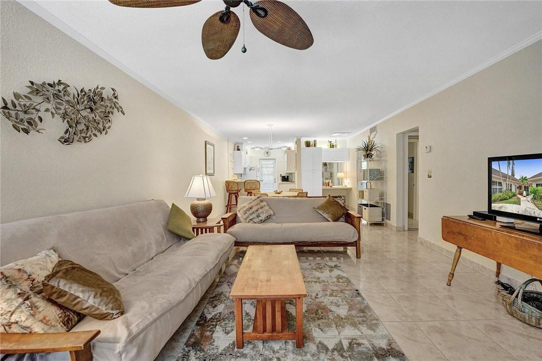 770 East Camino Real, Unit 3 Boca Raton, FL 33432 - Photo 6 of 34 a living room with furniture