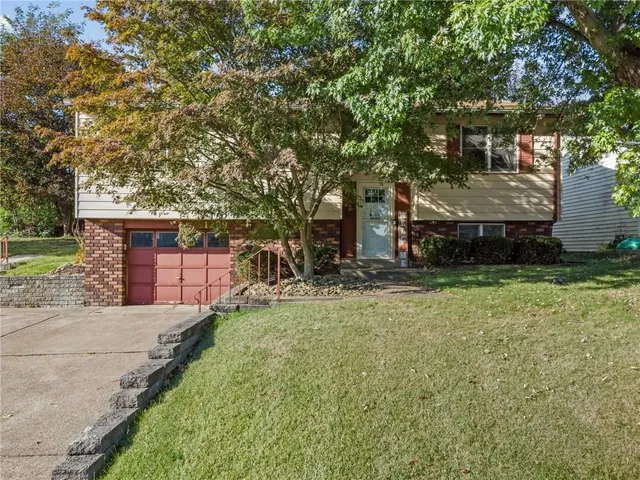 front view of house with a yard