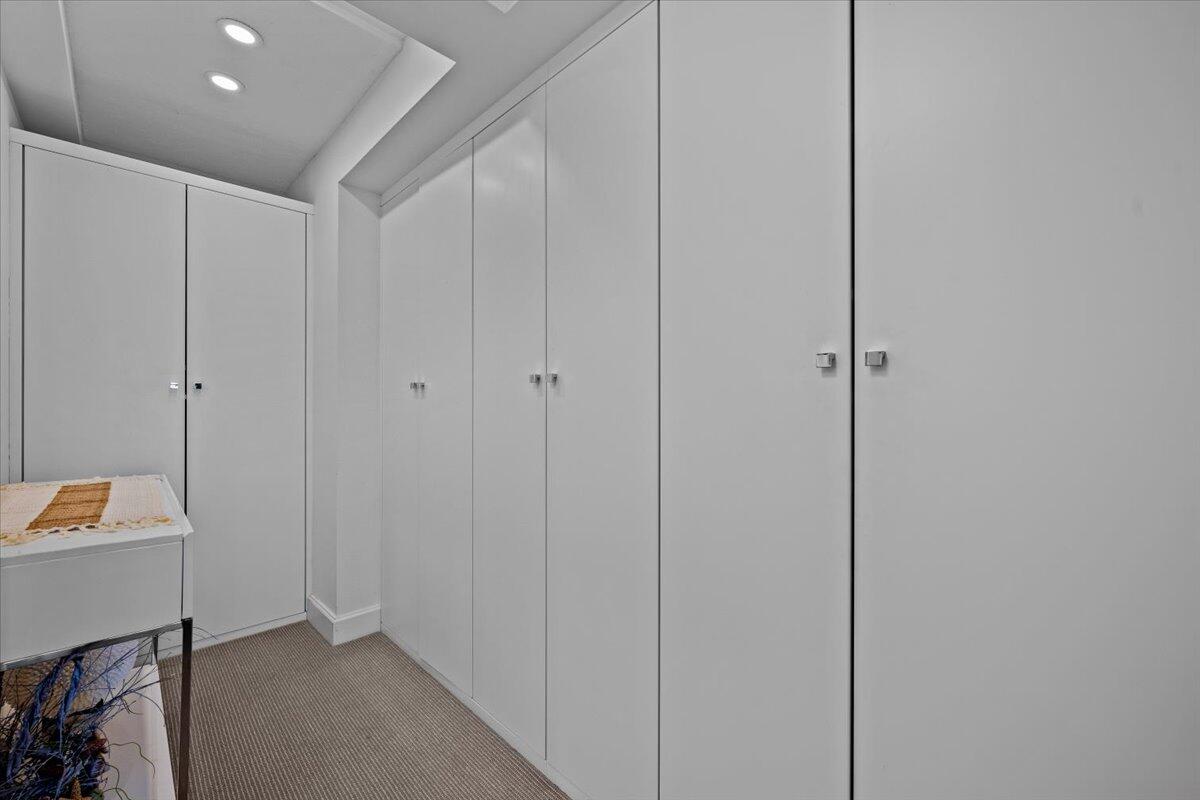 200 Ocean Trail Way, Unit 604 Jupiter, FL 33477 - Photo 17 of 44 Owner's Suite Custom Closets
