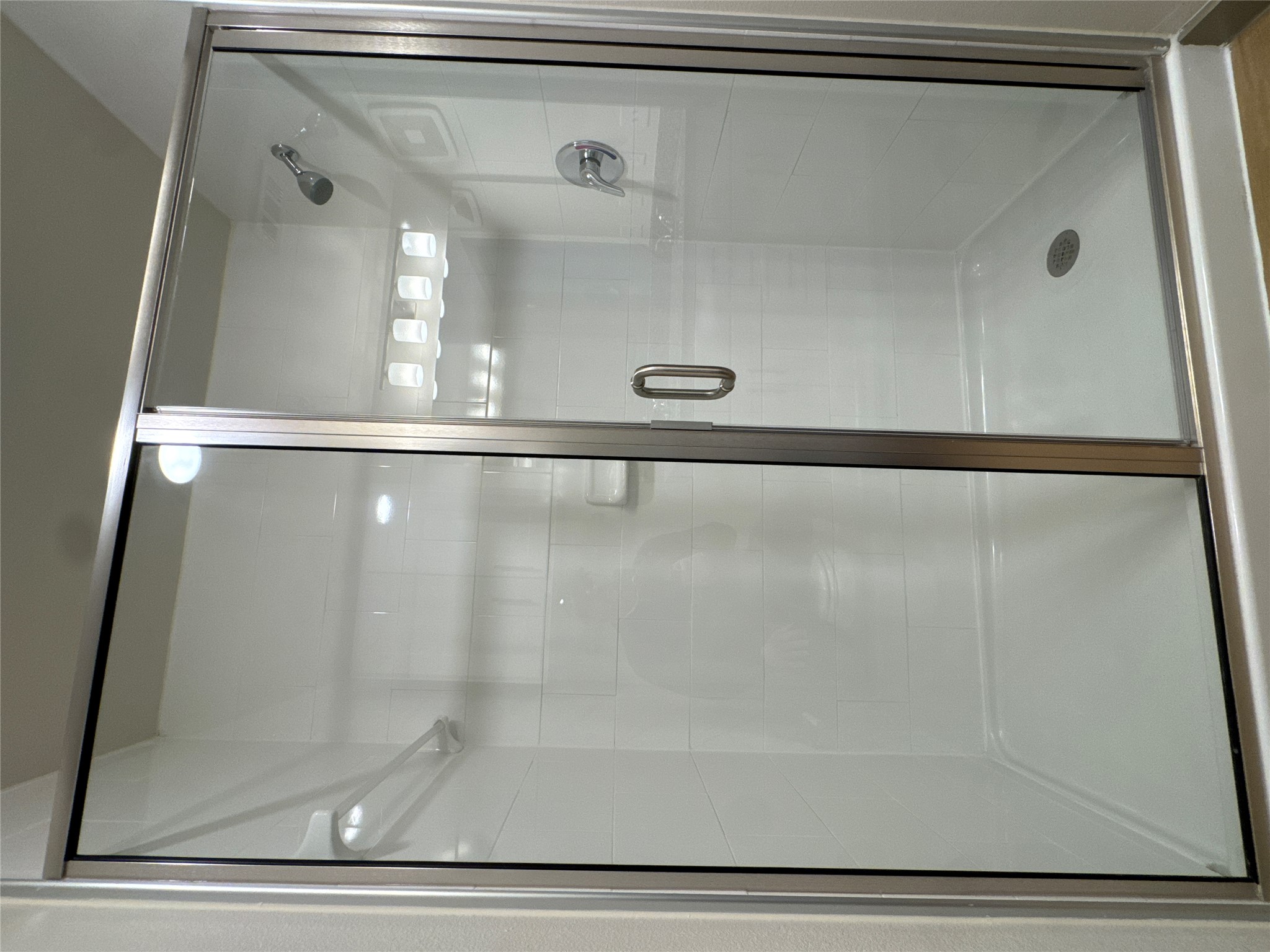 691 Union Chapel Road, Unit C1 Cedar Creek, TX 78612 - Photo 15 of 35 a bathroom with a glass shower door