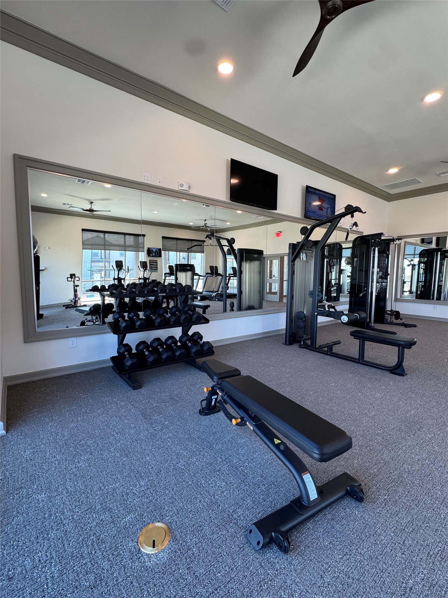 691 Union Chapel Road, Unit C1 Cedar Creek, TX 78612 - Photo 27 of 35 a room with gym equipment and a large window