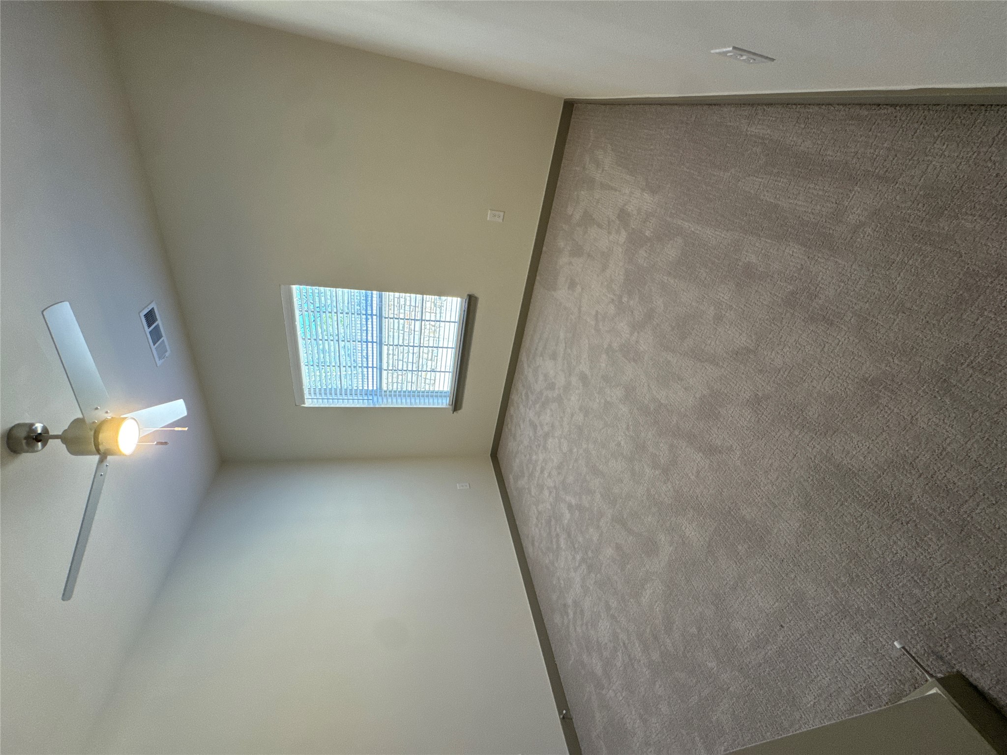 691 Union Chapel Road, Unit C1 Cedar Creek, TX 78612 - Photo 7 of 35 an empty room with windows and ceiling fan