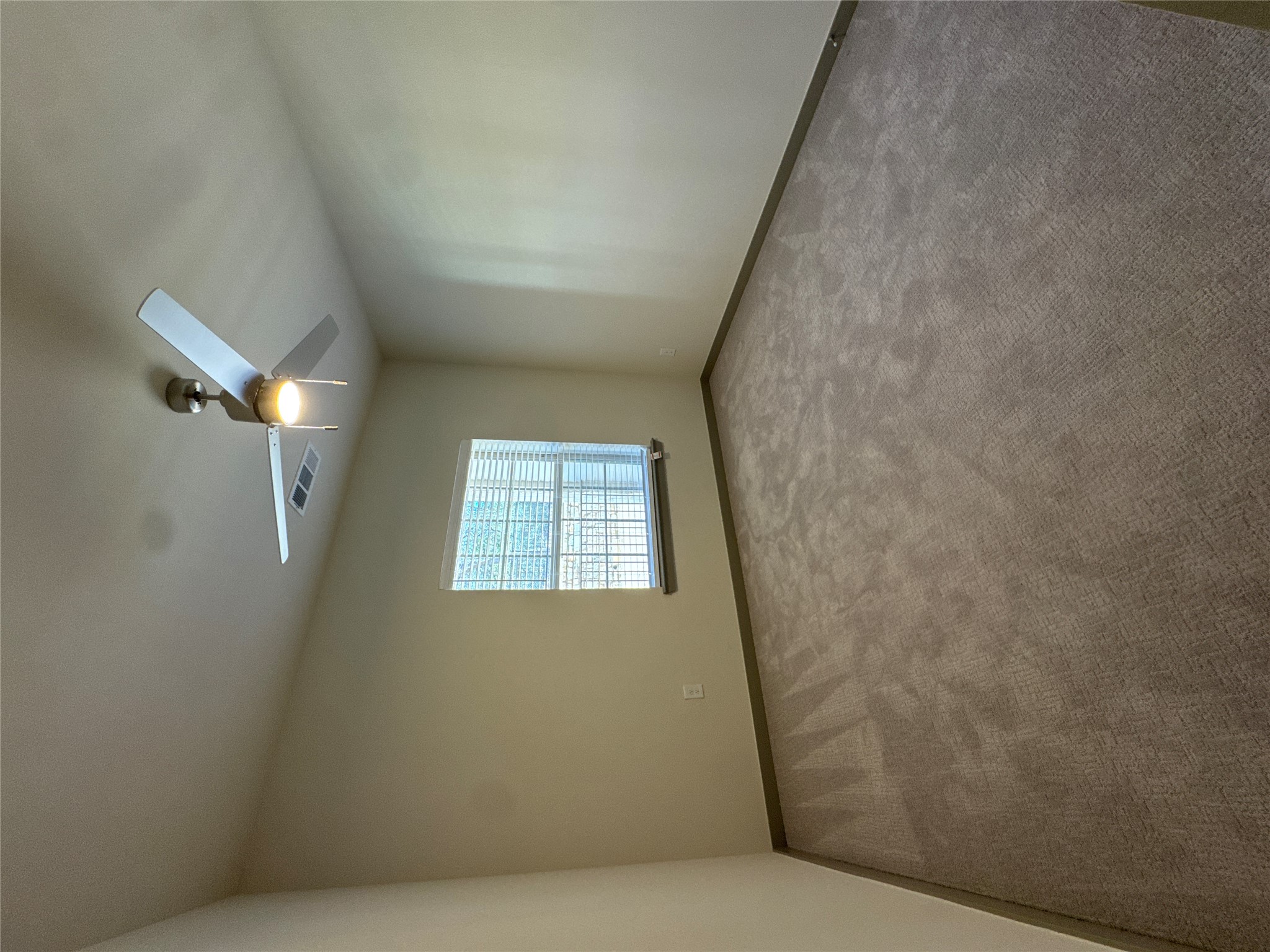 691 Union Chapel Road, Unit C1 Cedar Creek, TX 78612 - Photo 8 of 35 an empty room with windows and ceiling fan