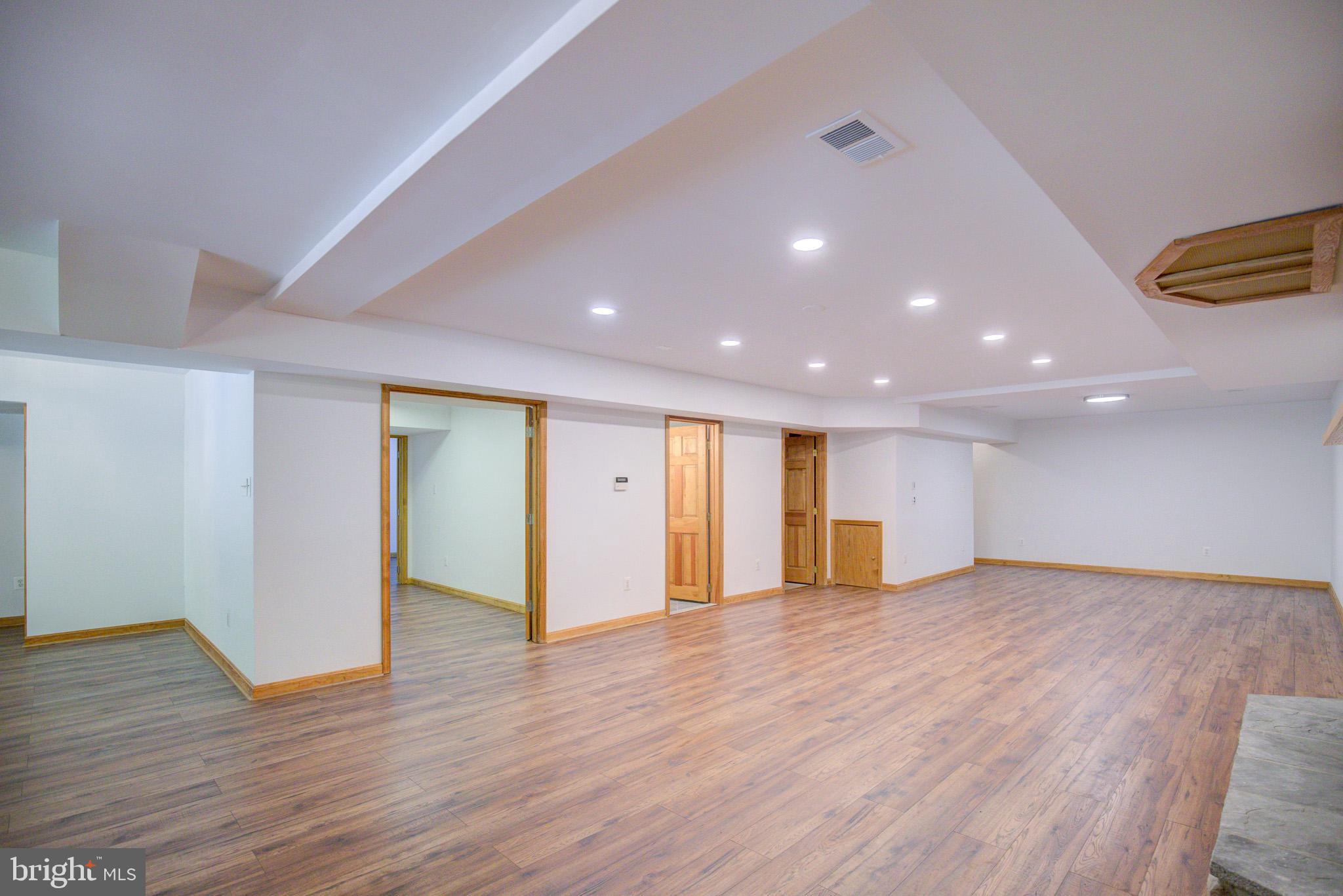 813 Blacks Hill Road Great Falls, VA 22066 - Photo 57 of 92 LL Rec. Room w/ NEW flooring & recessed lights!
