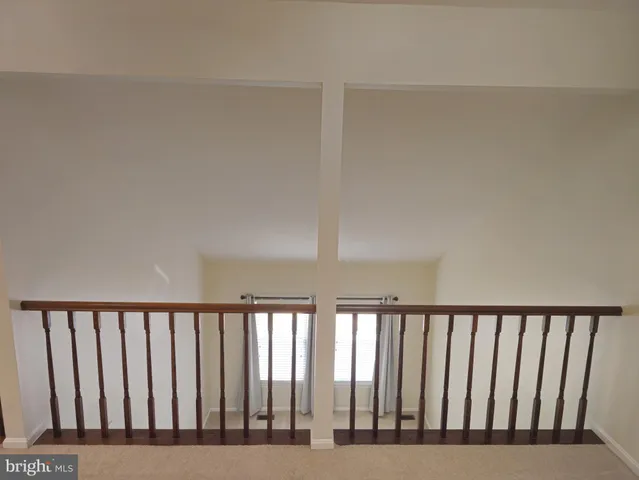 a view of a small space with a fan