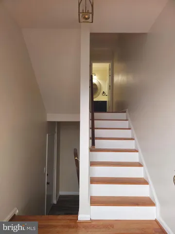 a view of entryway with wooden floor