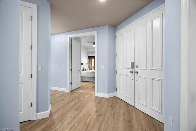 a view of a bathroom from a hallway