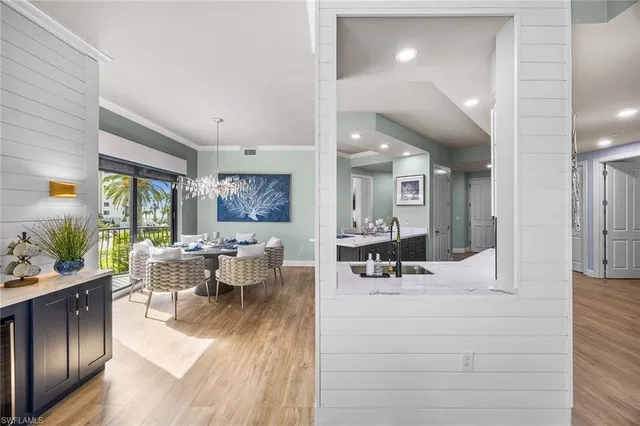 a view of a living room and dining room