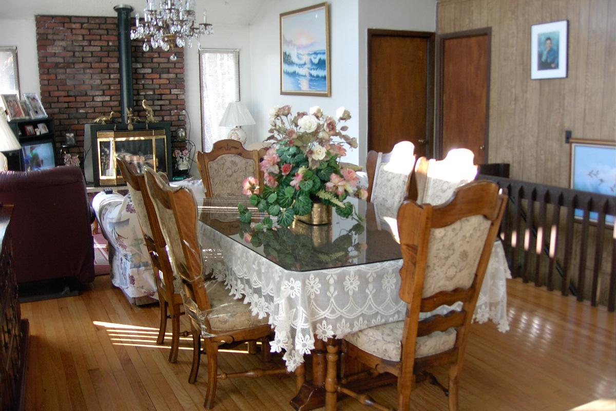 Saunders Drive Bushkill, PA 18324 - Photo 2 of 10 a dining room with furniture and wooden floor
